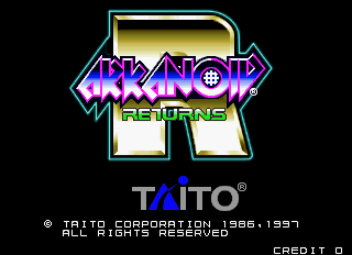 The title screen displays the Arkanoid Returns logo in large purple and blue letters with a metallic border effect centered in the upper half. Below the logo are two empty white rectangular boxes. The TAITO trademark appears in cyan text at the bottom, with copyright information for Taito Corporation from 1996-1997 and a credit counter showing zero in the lower right corner. The background is solid black.