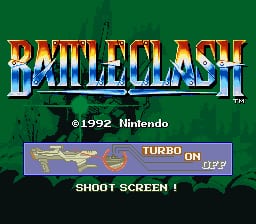 The Battle Clash title screen displays the game's logo in large yellow and blue letters at the top, with a green textured background. Below the logo, a copyright notice reads "©1992 Nintendo." A horizontal banner in the middle shows a blue jet fighter labeled "TURBO ON" with speed indicators. At the bottom, white text reads "SHOOT SCREEN 1" in a simple sans-serif font. The overall layout uses a 16-bit color palette typical of early SNES graphics.