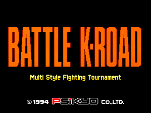 The title screen displays "BATTLE K-ROAD" in large orange capital letters centered against a black background, with yellow text reading "Multi Style Fighting Tournament" positioned directly below. A copyright notice at the bottom states "© 1994 PSIKYO CO. LTD." in white text. The layout is simple and symmetrical, with no additional graphics, characters, or animated elements visible.