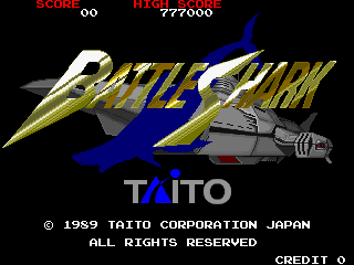 The title screen displays two large yellow jet fighter sprites in the center against a dark blue background, with a gray military vehicle below them. Red text reading 'SCORE' and 'HI SCORE 777000' appears at the top left and right respectively. The word 'TAITO' is prominently centered in blue letters below the aircraft, followed by copyright text '© 1989 TAITO CORPORATION JAPAN ALL RIGHTS RESERVED' and 'CREDIT 0' in the lower left. The overall composition uses a black background with bright yellow and blue accent colors typical of late-1980s arcade aesthetics.