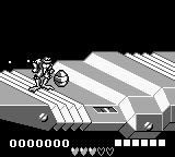 A motorcycle rider in monochrome pixel art travels across diagonal striped road terrain against a black background. The sprite shows a character leaning forward on a bike moving from left to right. At the bottom of the screen, a row of UI elements displays the score reading 0000000 on the left and what appears to be status indicators or power-ups represented as small squares across the right side. The graphics use high contrast black and white with sharp pixelation typical of Game Boy hardware.