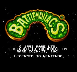 The title screen displays the Battletoads in Battlemaniacs logo in large yellow-green lettering with a red outline, arched across the top center against a black background. Below the logo, white text reads "1993 RARE LTD." followed by licensing information for Nintendo and "RARE COIN-IT, INC." The sprite-based 16-bit graphics show bright primary colors typical of early 1990s SNES visuals, with the logo rendered in bold pixelated text.