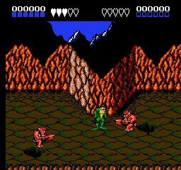 A side-scrolling level displays three toad characters positioned on a checkered floor pattern with brown and green coloring. Orange and brown textured mountains form the background, with a blue sky at the top featuring a bat-like silhouette. The HUD spans the top of the screen showing score counters on the left, health indicators represented by small icons in the center, and additional status displays on the right. Pixelated sprites and tile-based level geometry are rendered in a limited NES color palette typical of early 1990s cartridge graphics.
