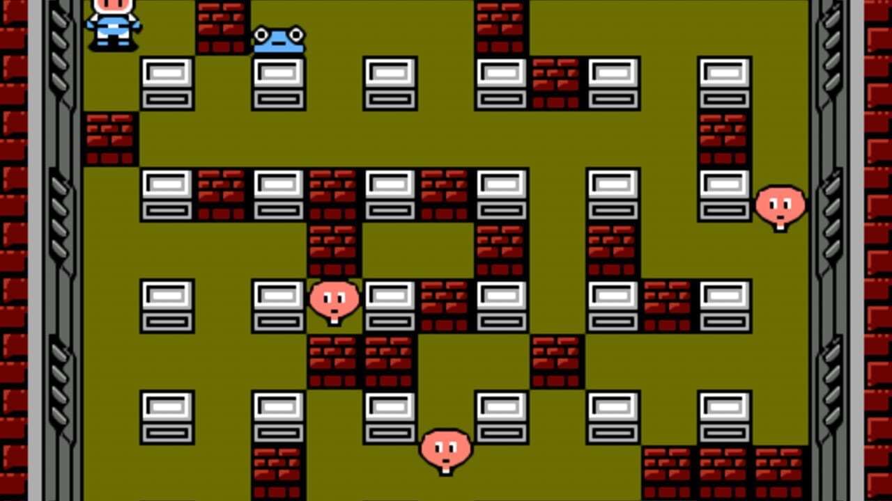 A maze-like level with olive-green pathways separated by red brick walls and white destructible blocks arranged in a grid pattern. Three pink Bomberman characters are positioned at different locations: one in the upper left, one in the center-left area, and one in the lower-center section. The play area is framed by gray and red brick borders on all sides. White blocks with darker horizontal lines represent movable or destructible elements scattered throughout the maze layout.