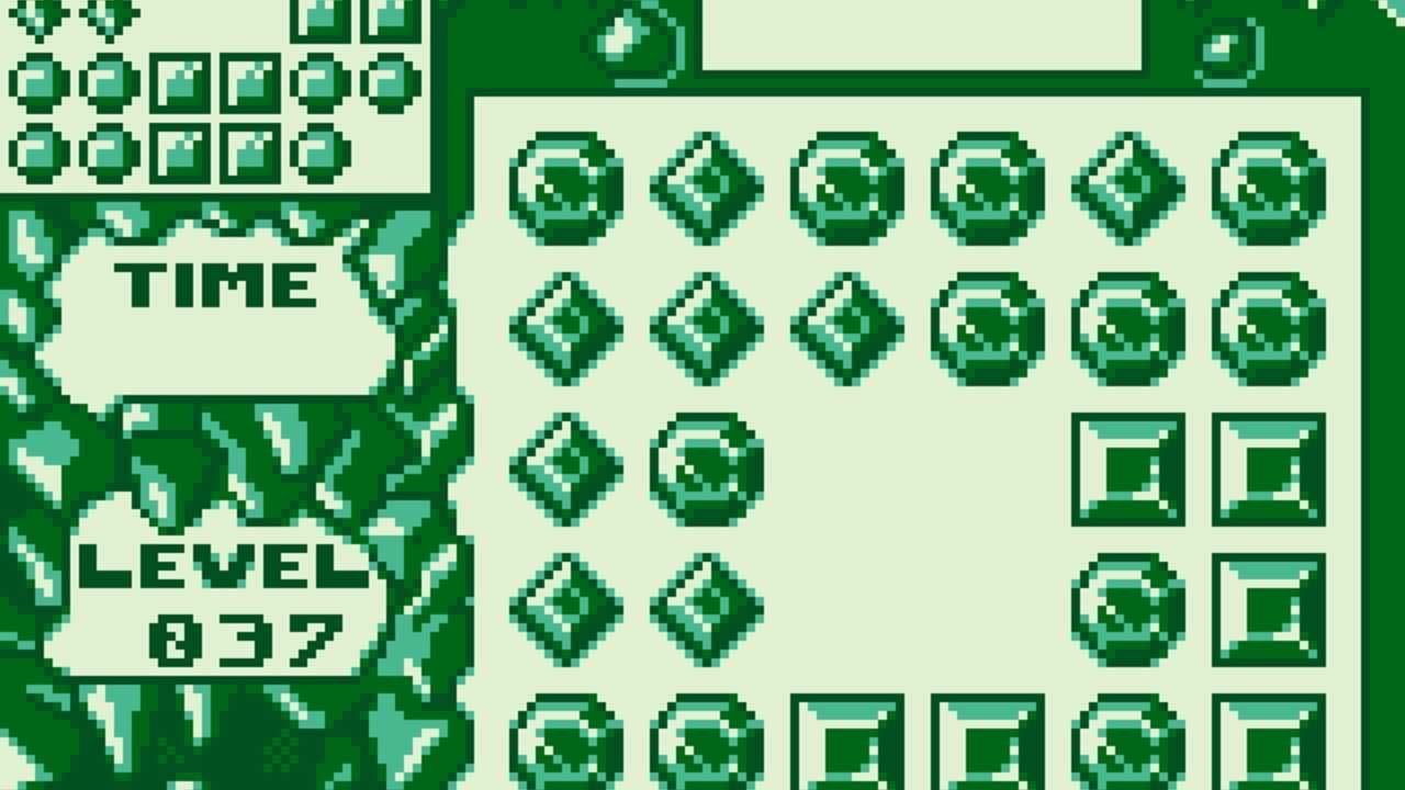 A game menu interface displays a 6x6 grid of puzzle icons in green and cream tones. The grid contains circular orbs with clockwise arrows, diamond shapes, and square frame symbols arranged in rows. The left panel shows a "TIME" label and "LEVEL 037" text, with a smaller icon palette at the top displaying additional puzzle pieces. The overall palette uses shades of green and light cream with pixelated 8-bit graphics typical of Game Boy presentation.