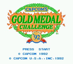 The title screen displays a large green oval badge with 'CAPCOM'S' and 'GOLD MEDAL CHALLENGE' in yellow and red lettering, framed by orange flame graphics on both sides. A gold medal with the number 92 sits centered below the badge. Menu text reads 'PRESS START' in blue, followed by copyright information for Capcom U.S.A., Inc. from 1992. The background is light gray with a simple border frame around the entire layout.