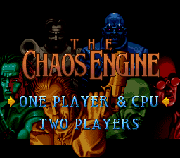 The title screen displays 'THE CHAOS ENGINE' in large orange and yellow letters centered on a black background. Below the title are four colorful robot characters in a row—green on the left, orange in the center-left, yellow in the center-right, and blue on the right. Beneath the characters, two menu options appear in blue text: 'ONE PLAYER & CPU' above 'TWO PLAYERS'. The sprite art uses the characteristic 16-bit pixel style of early 1990s SNES games, with vibrant primary colors against the dark backdrop.