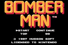 The title screen displays "BOMBERMAN" in large orange pixelated letters centered on a black background. Below the title are four menu options arranged vertically: "START TOP", "CONT INUE", and two additional options. At the bottom, white text reads "LICENSED TO NINTENDO". The sprite-based graphics use a yellow-orange color palette typical of 8-bit Game Boy Advance presentations.