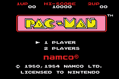 The title screen displays a large pink pixelated "PAC-MAN" logo centered at the top. Below are menu options showing "1 PLAYER" and "2 PLAYERS" in white text. Score indicators appear at the top left showing "1UP" and "2P" with numerical values. The copyright notice at the bottom reads "© 1980, 1984 NAMCO LTD." and "LICENSED TO NINTENDO" in red text. The background is black with minimal visual elements beyond the title treatment.