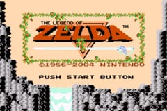 The title screen displays "THE LEGEND OF ZELDA" text in orange at the top, framed by decorative green foliage borders. Below sits the game's logo in large orange lettering against a light beige background. At the bottom, white text reads "PUSH START BUTTON" and smaller text indicates "©1986-2004 NINTENDO". The entire screen uses 8-bit pixel art styling characteristic of NES-era graphics.