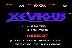 The Xevious title screen displays the purple pixelated logo at top center, with "1 PLAYER" and "2 PLAYERS" options beneath it. Score displays show "1UP 00" and "HI 58886" with "2UP 00" at the corners. The Namco copyright notice and Nintendo license text appear at the bottom in orange and white text against the black background. The sprite-based graphics use the characteristic limited color palette of early arcade-to-NES port visuals.