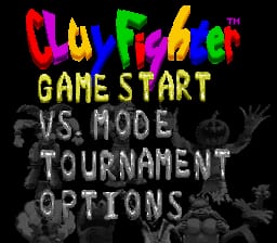 The title screen displays "ClayFighter" in large, colorful pixelated letters at the top in red, yellow, and green. Below it, four menu options appear in yellow text: "GAME START", "VS. MODE", "TOURNAMENT", and "OPTIONS". The background is dark with gray silhouettes of stylized clay fighter characters positioned around the edges, creating a border effect. The overall composition uses a black background with bright primary colors for text and muted tones for the character silhouettes.