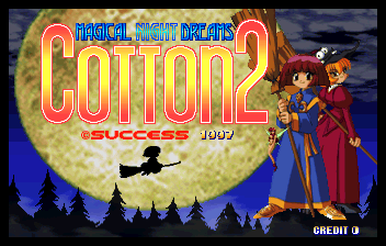 The title screen displays "COTTON 2" in large yellow text with a red arcade-style border at the top and bottom. A large glowing moon occupies the upper portion of the background, set against a dark blue night sky with silhouetted trees. On the right side stand two anime-style characters in colorful costumes against a starry backdrop. A black silhouette of a witch on a broomstick flies across the moon's surface. The Success company logo and "1997" appear at the bottom center, with "CREDIT 0" shown in the lower right corner in arcade font.