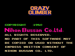 The title screen displays "CRAZY CLIMBER" in large orange capital letters at the top center against a black background. Below sits copyright information in green text reading "COPYRIGHT 1980", followed by "Nihon Bussan Co.Ltd" in magenta, and white legal text stating all rights reserved and usage restrictions. The developer credit "NIHON BUSSAN CO., LTD." appears at the bottom in white text. The entire layout uses a simple pixelated arcade font typical of early 1980s games.