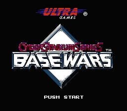 The title screen displays the Ultra Games logo at the top in red text, followed by the Cyber Stadium Series subtitle and Base Wars title in large white block lettering centered on a black background. A blue diamond-shaped outline frames the composition vertically. Below the title text, "PUSH START" appears in small white capital letters at the bottom center of the screen.