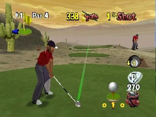 A golfer in red stands on a green fairway preparing to swing at a white golf ball. The HUD displays Par 4, a score of 339, and 15 shots remaining in the upper area. A power meter and distance indicator showing 270 yards appear on the right side. The background shows a sandy bunker, trees, and another player in the distance on a desert-style golf course. The graphics use the polygonal style typical of Nintendo 64 golf games with a muted earth-tone color palette.