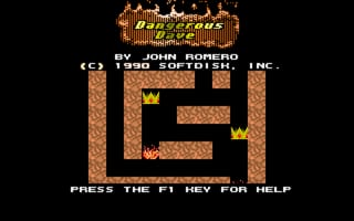 The title screen displays "Dangerous Dave" in orange pixelated lettering at the top, with credit text reading "BY JOHN ROMERO" and "(C) 1990 SOFTDISK, INC." below it. The main play area shows a brown brick maze-like structure with two yellow crown icons positioned in the upper corners. At the bottom, white text instructs "PRESS THE F1 KEY FOR HELP". The background is solid black, and the overall aesthetic uses low-resolution 8-bit sprite graphics typical of early 1990s DOS games.