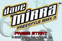 The title screen displays the Dave Mirra Freestyle BMX 3 logo in large white and yellow lettering at the top center, with a partial bicycle wheel visible in the background. Below the title, "FREESTYLE BMX 3" appears in smaller text, followed by "PRESS START" in the lower portion. A copyright notice for 2005 Acclaim Entertainment, Inc. is visible at the bottom. The background features a light blue gradient with a faint bicycle wheel graphic.