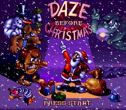 The title screen displays 'DAZE BEFORE CHRISTMAS' in large pink and cyan text against a purple starry background. A rotund character in red and white Santa-like clothing stands in the center, surrounded by colorful gift boxes and wrapped presents in blue, orange, and brown tones. Smaller toy-like characters and objects cluster around the main figure. 'PRESS START' appears in yellow text at the bottom. The art style uses bright 16-bit sprites with a festive palette of purples, reds, greens, and golds against the dark night sky, with snow or sparkles scattered throughout the composition.