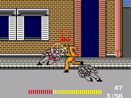 A player character in yellow clothing stands on a gray street in front of a brick building with blue-trimmed windows and a red door. An enemy figure in white and brown is visible to the right. The scene uses a side-scrolling perspective with parallax brick wall backgrounds. A health bar spans the bottom in red and yellow segments, with a score counter displaying 47 in the lower right. Sprite-based pixel art with distinct outlines defines the action-oriented visual style.