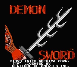 The title screen displays red pixelated text reading 'DEMON' at the top and 'SWORD' at the bottom. A large three-pronged trident weapon rendered in silver and gray occupies the center-right portion of the screen. An ornate red and gold decorative element appears on the left side. Black background fills the remaining space. Copyright text for Taito America Corp. and a TM symbol appear in white at the bottom. The overall color palette uses red, white, gray, and black on a dark background.