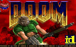 The DOOM title screen displays the large golden pixelated logo at the top center against a red background. Below it, a muscular demon character in green armor holds a weapon and grins menacingly. A small blue demon head icon appears in the upper left corner. The id Software logo and copyright text are visible in the lower right, with white and yellow text on the red backdrop. The overall composition uses a dark red gradient with the title and character art as the focal points.