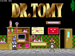 The title screen displays "DR.TOMY" in large gold letters centered at the top. Below is a detailed interior scene showing a medical office with green wallpaper, a desk with medical equipment, shelves with bottles and supplies, a computer monitor, a door on the right, and two pixel-art characters positioned on either side of the room. A coin counter reads "COIN 00" in the upper left corner, and the Playmark logo appears in the upper right. The art style uses 16-bit sprite graphics with a colorful palette of browns, greens, reds, and flesh tones.