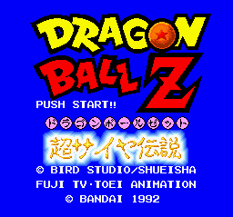 The title screen displays "DRAGON BALL Z" in large yellow and red pixelated text against a solid blue background. Below the title, white text reads "PUSH START!" followed by a row of eight circular character select buttons with yellow borders. Japanese characters appear in red text in the middle section. At the bottom, white text lists credits including "BIRD STUDIO/SHUEISHA," "FUJI TV·TOEI ANIMATION," and "© BANDAI 1992." The overall design uses a bright color palette typical of early 1990s SNES graphics with sprite-based lettering and simple geometric layout elements.