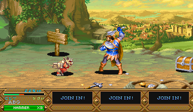 A blue-armored warrior stands center-right in a side-scrolling fantasy landscape with rolling hills and a distant castle under a yellow sky. A wooden sign points left, while a brown enemy figure appears on the ground to the left. The bottom UI displays health bars, a score counter at left, and four prompt buttons reading "JOIN IN!" across the lower center, indicating multiplayer functionality. Pixel art sprites and painted background environments show the arcade game's 16-bit visual style.