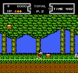 A side-scrolling platformer level displays a character in the center of a grassy terrain with blue water columns rising from a blue water section below. The top HUD shows HP (6000), a P-2 indicator, and time counter (492). Green grass fills the upper portion, brown earth forms the ground layer, and yellow-brown wooden pillars rise vertically from the water, creating an obstacle course. The sprite-based graphics use a limited NES color palette with clear pixel definition typical of 8-bit era design.