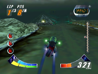 A futuristic spacecraft races through a dark underwater or alien cavern environment. The player's vehicle appears in the center-left, rendered in purple and dark metallic tones, with a health or shield bar displayed below it. The HUD shows lap 1 of 3 and a speed readout of 321. Three circular life indicators appear on the left side. A minimap with a dotted path line occupies the right edge. Terrain features glow with green bioluminescent highlights. The environment uses a teal and dark green color palette typical of late-1990s 3D racing games on Nintendo 64.