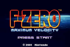 The F-Zero: Maximum Velocity title screen displays the orange pixelated logo at the center against a dark blue background with a metallic streaked texture behind it. Below the title, white text reads "MAXIMUM VELOCITY" in a thin sans-serif font. At the bottom of the screen, "PRESS START" appears in white text, with a copyright notice for Nintendo 2001 positioned in the lower left corner. The overall composition is centered and symmetrical.