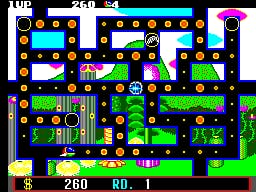A maze-based overhead-view level features a protagonist character in the center navigating through corridors lined with yellow pellets and colored power-ups. The playfield is bordered by blue walls with circular nodes at corners, while enemies in various colors patrol the passages. A black background fills the space outside the maze perimeter. The HUD displays the score 260 at top left and bottom left, with level indicator 80.1 at the bottom right. Pixel art sprites and 16-bit color palette characterize the SMS-era graphics.