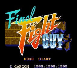 The title screen displays the Final Fight Guy logo in large stylized text, with cyan, yellow, and red coloring positioned in the upper half against a black background. Below the logo sits a brown brick wall texture. In the lower portion, a blue pixel-art character sprite appears on the right side. Copyright text reads "© CAPCOM 1990, 1992" centered at the bottom, with "PUSH START" displayed above it. The overall art style uses 16-bit sprite graphics typical of early 1990s arcade-to-console ports.