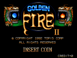 The title screen displays 'Golden Fire II' in large gold letters with blue outline at center, flanked by two ornate tiger heads with glowing orbs in their mouths on either side. Copyright text for Topis Corp 1992 appears at top, with 'INSERT COIN' in gold text below the title and 'CREDIT=0' in the lower right corner. The background is black with orange decorative elements framing the tigers.