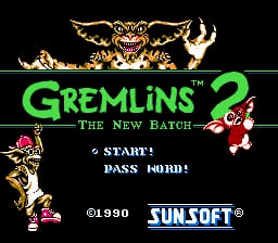 The title screen displays a black background with "GREMLINS 2" in large green letters at the center, flanked by a winged gremlin sprite above and smaller gremlin sprites on either side. Below the title text reads "THE NEW BATCH" in smaller red text. The bottom of the screen shows "START" and "PASS MODE" options in white text, with a copyright notice "©1990 SUNSOFT" centered at the base. The sprite graphics use the NES's 8-bit color palette with detailed pixel art for the creature designs.