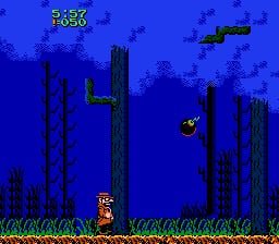 A detective character stands on green grass in the lower-left area of a blue nighttime forest scene filled with tall dark tree trunks. Yellow flying enemies move across the upper portion of the screen. A score display reading "2650" appears in yellow text at the top-left corner. The scene uses 8-bit sprite graphics with a blue gradient sky and silhouetted vertical tree structures creating depth in the level layout.