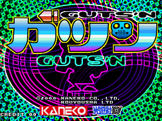 The title screen displays a large colorful logo reading "Guts'n" in gradient blue, purple, and orange lettering against a bright cyan pixelated background. Below the title sits a dark purple vinyl record graphic with magenta concentric circles. At the bottom, white text credits read "KANEKO" and "KOUYOUSHA LTD." with "NAMCO" visible on the left. A green "GUTS'N" label appears centered. The arcade screen shows "CREDIT 00" in red text on the lower left corner, typical of arcade cabinet display formatting.