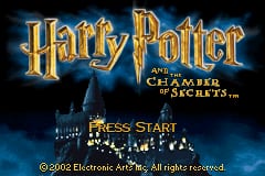 The title screen displays the Harry Potter and the Chamber of Secrets logo in gold ornate lettering at the top center, with Hogwarts castle rendered in dark silhouette against a blue-black starry background. Below the logo sits a "PRESS START" prompt and "TO PLAY" instruction in white text. A copyright notice for Electronic Arts and Eurocom appears at the bottom in small white type. The overall color scheme uses gold, dark blue, and black tones typical of Game Boy Advance graphics, with a gothic fantasy aesthetic matching the Harry Potter theme.