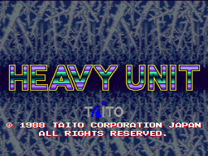 The title screen displays "HEAVY UNIT" in large, neon-colored block letters with a cyan and magenta gradient outline effect centered on the screen. Below the title sits a smaller "TAITO" logo. The background shows a repeating pixelated frost or crystalline pattern in blue and gray tones. At the bottom, white text reads "© 1988 TAITO CORPORATION JAPAN" and "ALL RIGHTS RESERVED" in a standard arcade font. A small copyright symbol appears in the lower left corner.