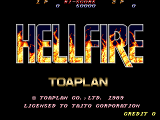 The title screen displays "HELLFIRE" in large pixelated letters filled with orange and yellow flame graphics against a black background. Below the title, "TOAPLAN" appears in gold text, followed by copyright information for Toaplan Co., Ltd. 1989 and licensing to Taito Corporation. At the bottom right, "CREDIT 0" is shown in yellow text. The overall composition uses a dark background with bright, fiery-colored lettering typical of arcade game title screens from the late 1980s.