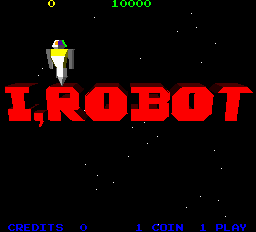 The title screen displays 'I.ROBOT' in large red pixelated letters at the center. A small robot sprite with a white head and colored body stands in the upper-left area. A score of '10000' appears in yellow text at the top center. The background is black. At the bottom, blue text reads 'CREDITS 0', 'COIN 1', and 'PLAY' in a simple arcade font. The overall visual style uses bright primary colors against a dark background typical of early 1980s arcade games.