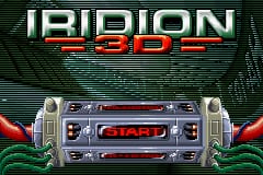 The Iridion 3D title screen displays the game's logo in metallic silver lettering with red accents at the top center. Below the logo sits a futuristic spaceship or vehicle rendered in 3D with a metallic gray hull, red wing-like structures on both sides, and a central red cockpit area. The background features a tiled green pattern creating a technical, geometric aesthetic. The overall composition emphasizes symmetry with the vehicle centered between the angular wing elements.