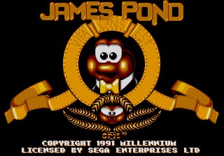 A title screen displays the orange text "JAMES POND" at the top, centered above a round character with large white eyes, a small mouth, and a brown body wearing a yellow bow tie, all contained within a concentric circular gold frame. Two orange ribbon banners extend outward from either side of the frame. Below the character sits a decorative gold ornamental divider. At the bottom, white text reads "COPYRIGHT 1991 MILLENNIUM" and "LICENSED BY SEGA ENTERPRISES LTD" against a black background.