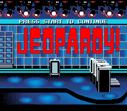 The title screen displays "JEOPARDY!" in large red pixelated letters against a blue background. Above the title text reads "PRESS START TO CONTINUE" in smaller white text. The scene features a cityscape with tall buildings rendered in blue and light blue tones. In the foreground, a stylized game show set with two podiums is visible, rendered in grayscale and dark tones. The overall aesthetic uses SNES-era 16-bit graphics with a limited color palette dominated by blues, reds, and grays. Small icons appear at the top of the screen.