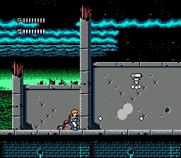 A split-screen vertical level layout shows a protagonist in the lower section navigating a gray industrial platform with floating white spheres and small projectiles, while the upper section displays a teal and green parallax-scrolling sky with horizontal wave patterns. Both sections feature pixel-art sprites with cyan, green, and gray color palette typical of NES-era graphics. A tall gray structure or tower is visible in the center, separating the two play areas.