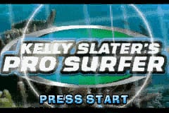 The title screen displays 'KELLY SLATER'S PRO SURFER' in large white text across the center, overlaid on a turquoise ocean wave background with white water spray visible at the top. Below the title, white text reads 'PRESS START' as a prompt for player input. The wave imagery fills the upper portion of the screen with a gradient blue sky and water effect creating depth.