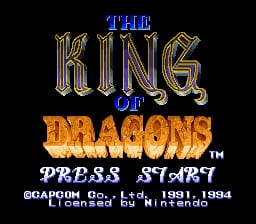 The title screen displays "THE KING OF DRAGONS" in ornate gold lettering at the top, with "OF DRAGONS" rendered in large orange-yellow letters below. A black background fills the screen. Text at the bottom reads "PRESS START" and credits listing "CAPCOM" and "1991-1994" in white and cyan pixels. The sprite art uses an 8-bit pixel style typical of early 1990s arcade-to-console ports.