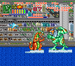 Two large pixel-sprite monsters clash in the foreground against a blue water background with white foam effects. A sprawling city skyline with buildings, billboards, and construction cranes fills the middle ground, rendered in colorful 16-bit graphics. A dense UI panel stretches across the top displaying health bars, character portraits, score counters, and numbered statistics in red and yellow text. The sprite artwork uses bold outlines and bright reds, greens, and yellows typical of early 1990s SNES fighter games.