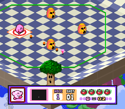 A top-down golf course view displays Kirby as a pink sphere on a blue and white diamond-patterned fairway. Multiple yellow and orange enemies are positioned across the course, with a green flag marking the hole. The HUD at the bottom shows a score panel with numbered indicators, power meter, and circular ability icons. The sprite-based graphics use a pastel color palette typical of early-nineties SNES games, with a three-dimensional perspective suggesting depth on the flat playing surface.